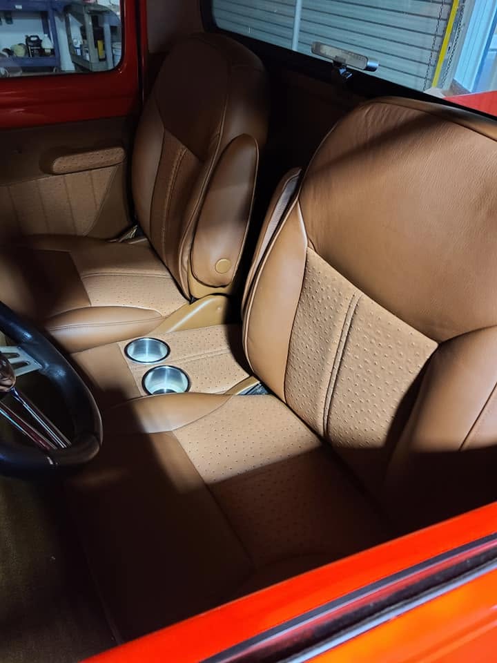 Tan marine helm seating at the wheel